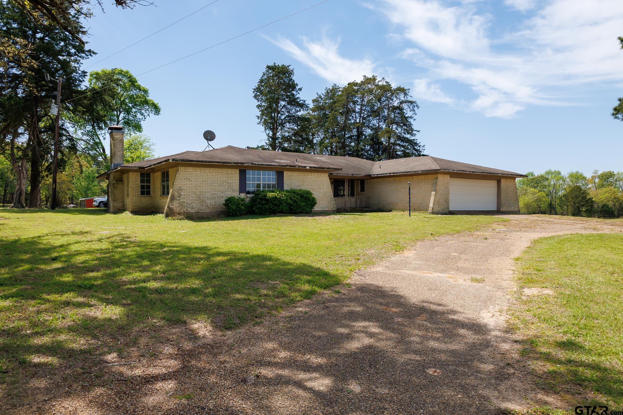 411 VZ County Road Ben Wheeler, TX 75754 - Photo 40 of 46 a view of a house with a yard