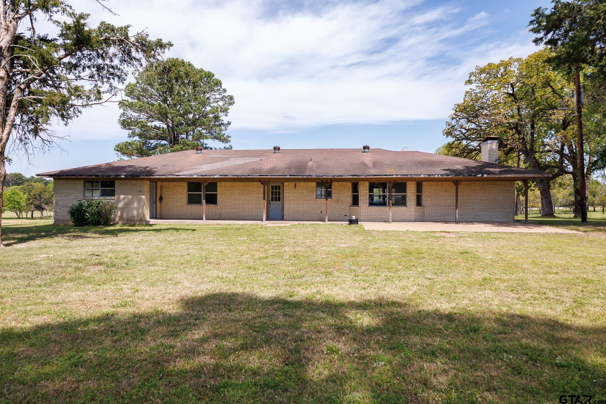 411 VZ County Road Ben Wheeler, TX 75754 - Photo 41 of 46 a front view of a house with a garden
