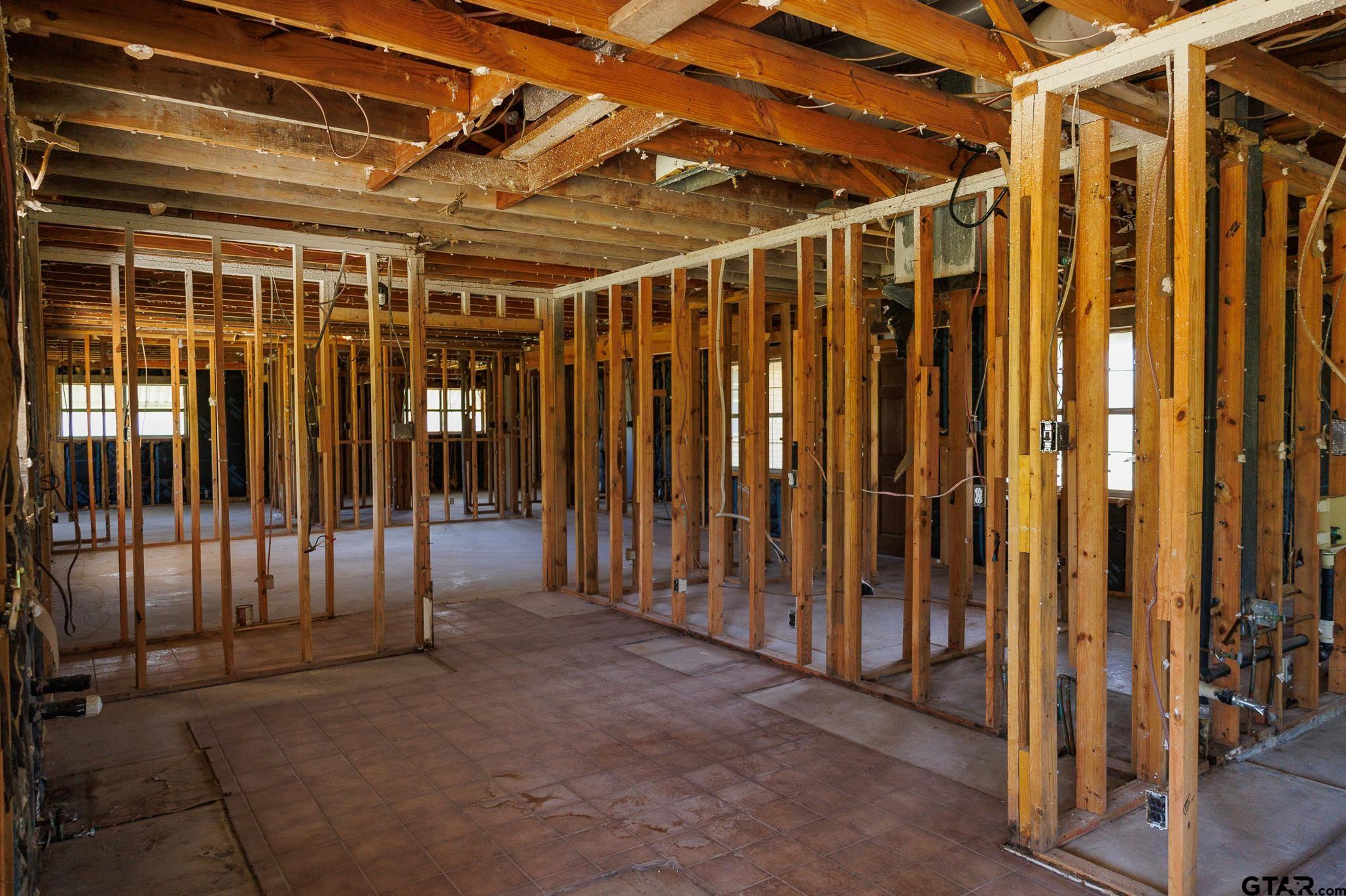 411 VZ County Road Ben Wheeler, TX 75754 - Photo 44 of 46 a view of an empty room with wooden walls