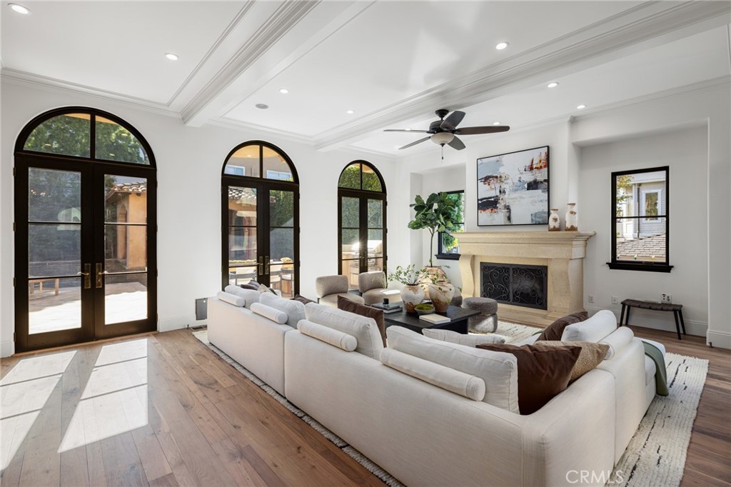624 14th Street Manhattan Beach, CA 90266 - Photo 24 of 75 a living room with furniture fireplace and large windows