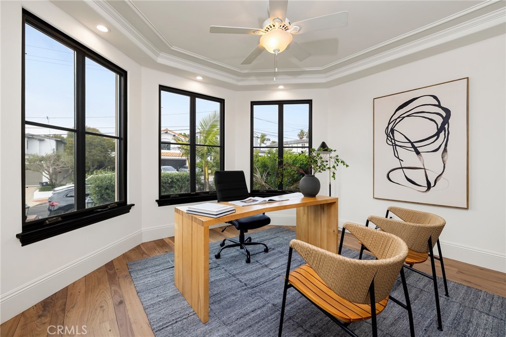 624 14th Street Manhattan Beach, CA 90266 - Photo 28 of 75 a work room with furniture and wooden floor