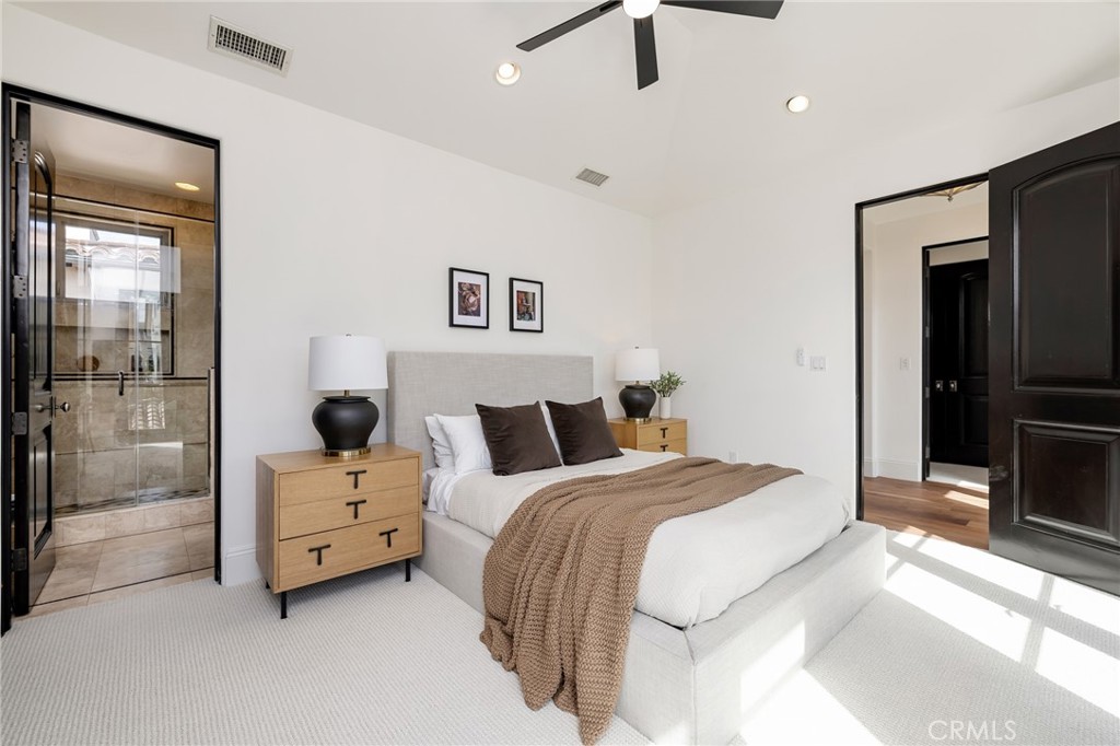 624 14th Street Manhattan Beach, CA 90266 - Photo 40 of 75 a bed room with a bed and a tv