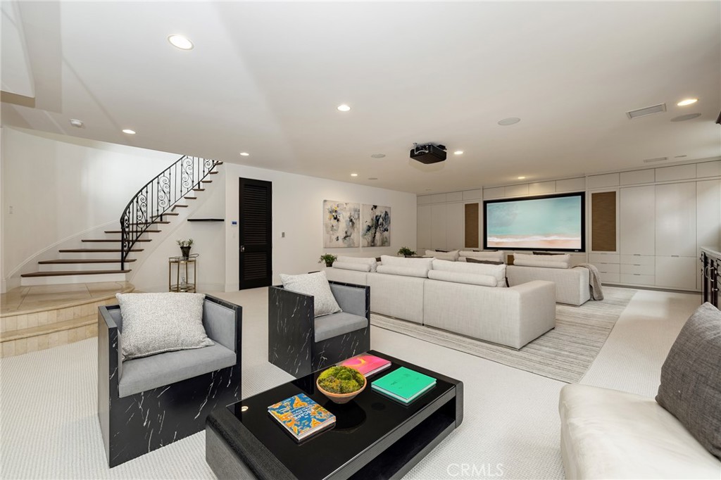 624 14th Street Manhattan Beach, CA 90266 - Photo 55 of 75 a living room with furniture and a flat screen tv