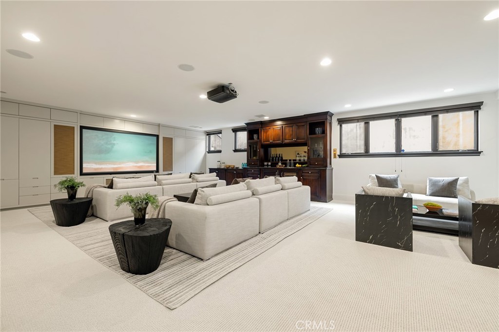 624 14th Street Manhattan Beach, CA 90266 - Photo 56 of 75 a living room with furniture and a flat screen tv