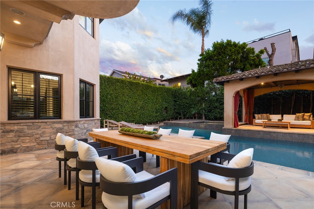 624 14th Street Manhattan Beach, CA 90266 - Photo 63 of 75 a outdoor dining space with furniture and outdoor view