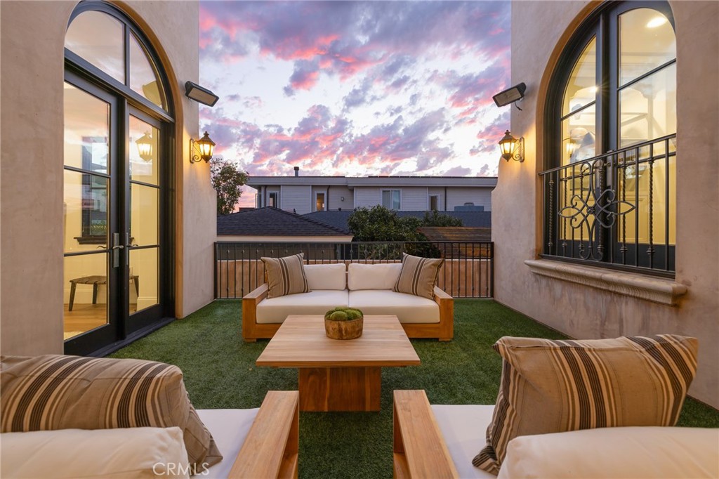 624 14th Street Manhattan Beach, CA 90266 - Photo 70 of 75 a living room with furniture fireplace and a large window