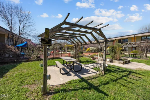 a view of a chairs and tables in the patio