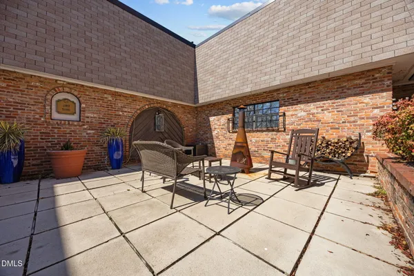 a view of a city with tall trees