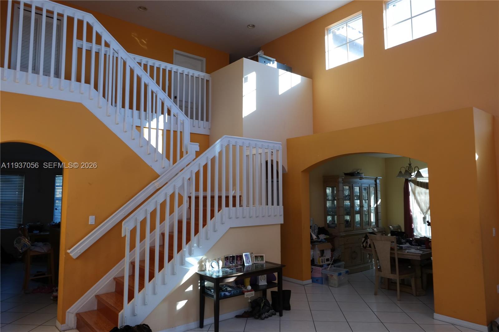 12641 Southwest 28th Street Miramar, FL 33027 - Photo 17 of 61 a view of entryway livingroom and hall with wooden floor