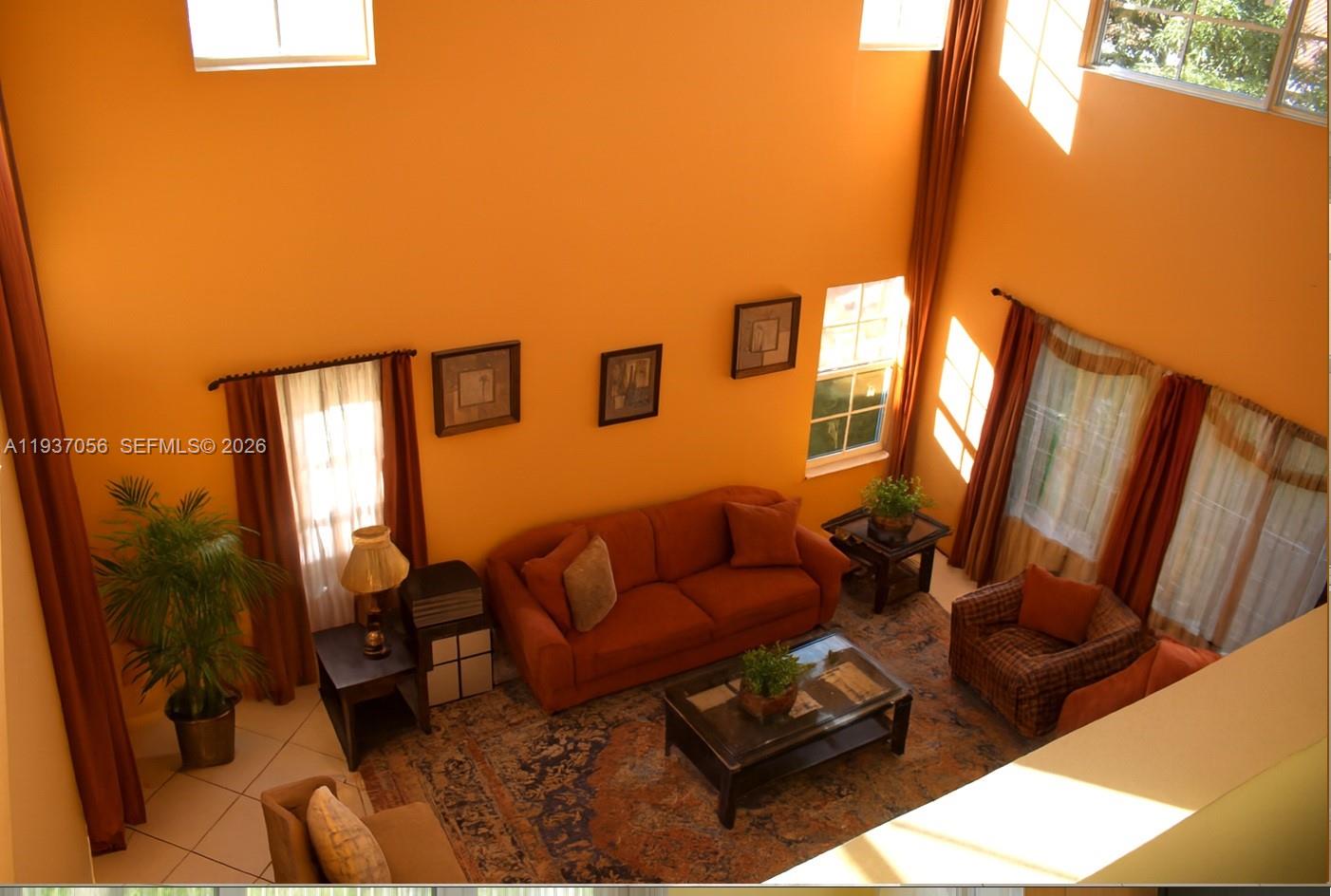 12641 Southwest 28th Street Miramar, FL 33027 - Photo 32 of 61 a living room with furniture
