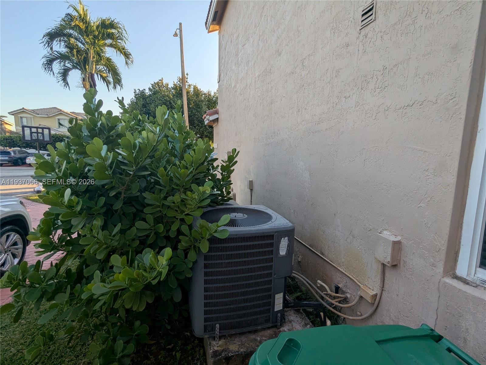 12641 Southwest 28th Street Miramar, FL 33027 - Photo 51 of 61 a bathroom with a sink a toilet and a mirror