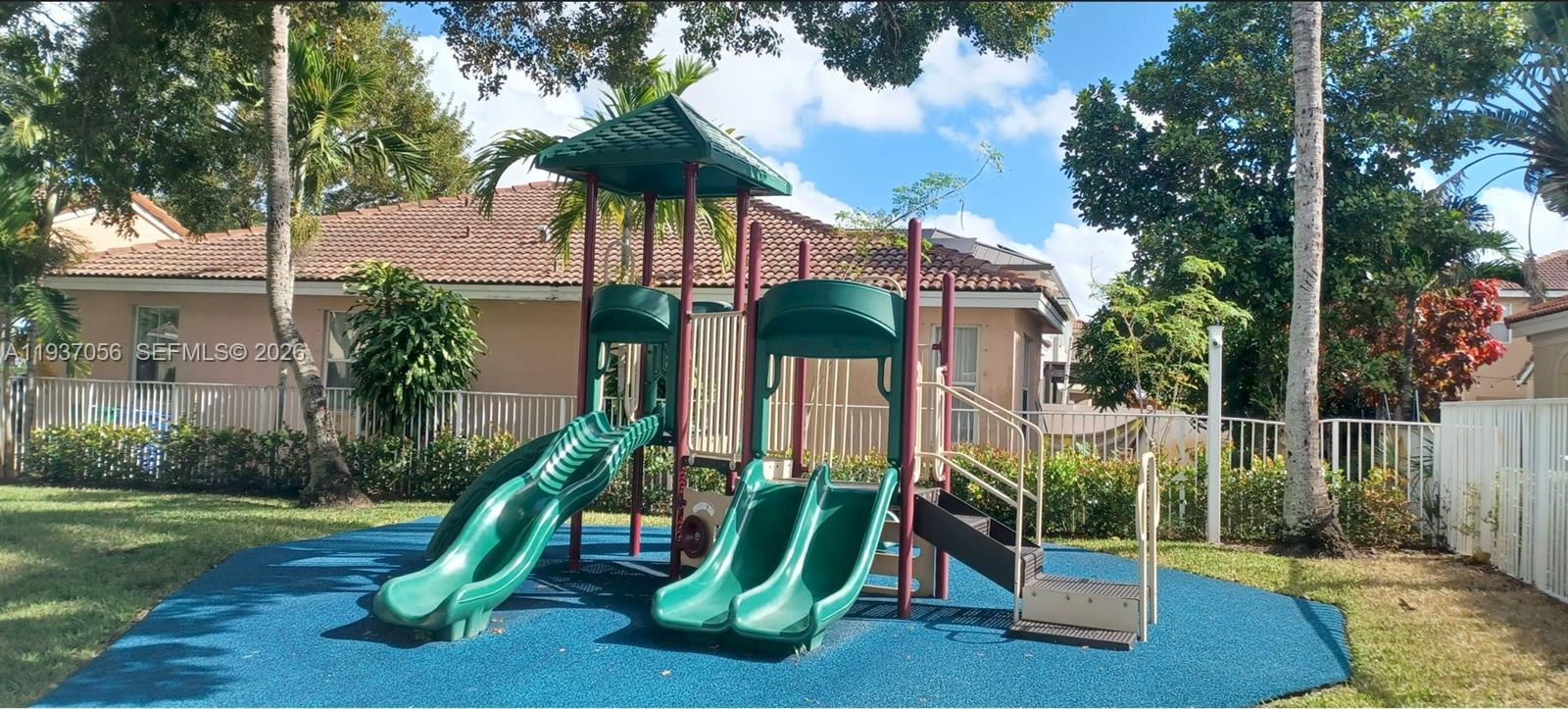 12641 Southwest 28th Street Miramar, FL 33027 - Photo 58 of 61 a view of a park with a slide
