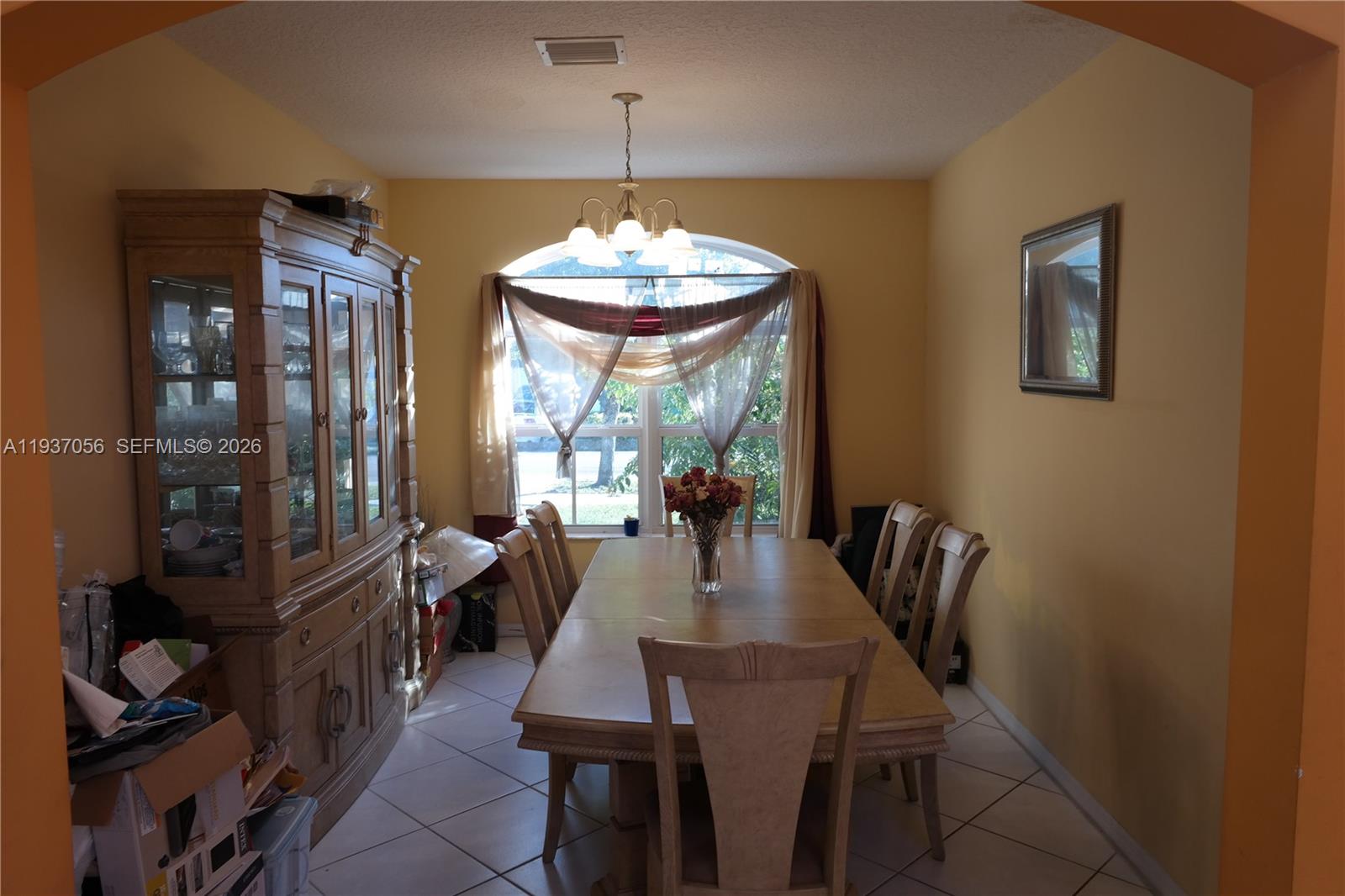 12641 Southwest 28th Street Miramar, FL 33027 - Photo 7 of 61 a view of a dining room with furniture window and outside view