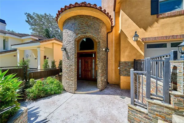 a view of a entrance gate of a house