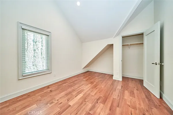 a view of an entrance of the house and trees