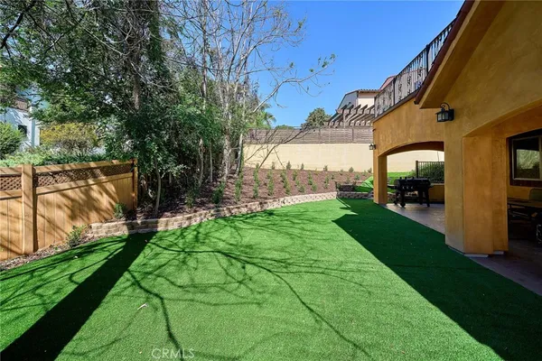 an aerial view of a house with a garden