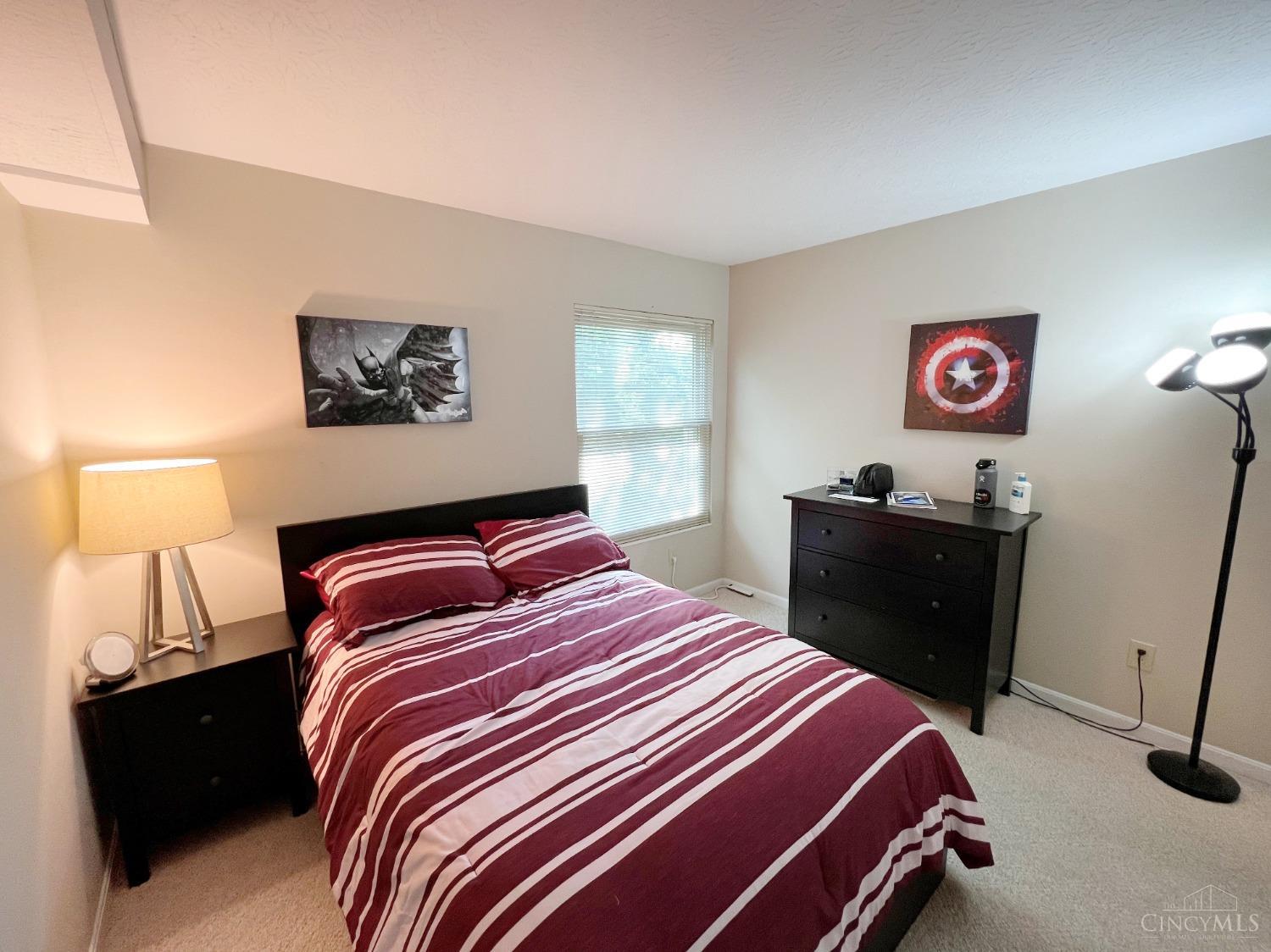 8408 Ridge Pointe Court, Unit 13 Reading, OH 45237 - Photo 20 of 39 Here's the 2nd bedroom with carpeting.