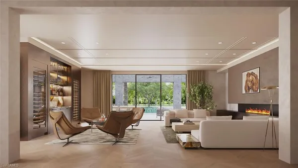 a living room with furniture and floor to ceiling windows