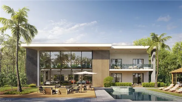 a view of a patio with table and chairs potted plants and palm tree