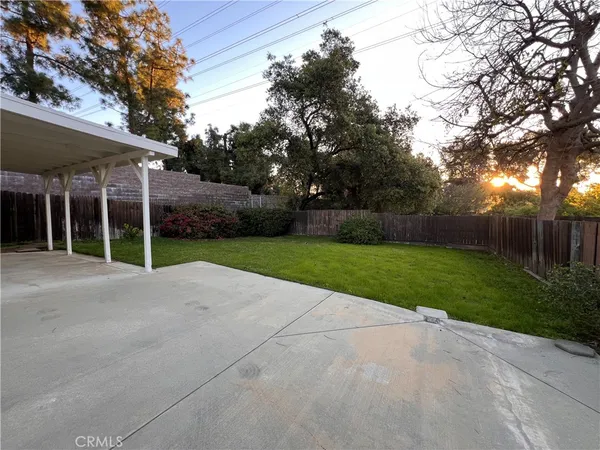 a house with a yard and a garage
