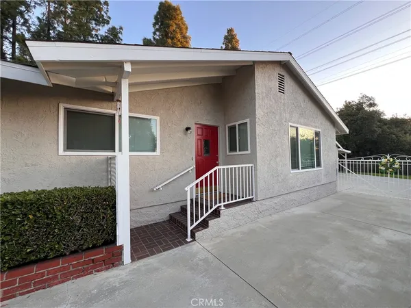 a view of a house with a porch