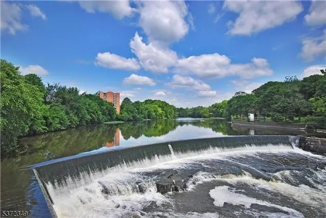 a view of a lake with a yard
