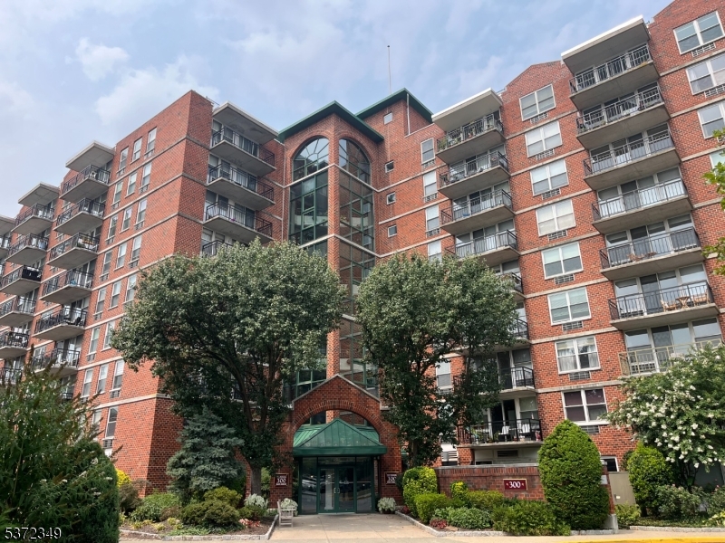 300 Main Street, Unit 901 Little Falls, NJ 07424 - Photo 2 of 15 front view of a building
