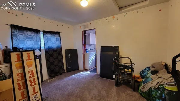 a view of a hallway with workspace