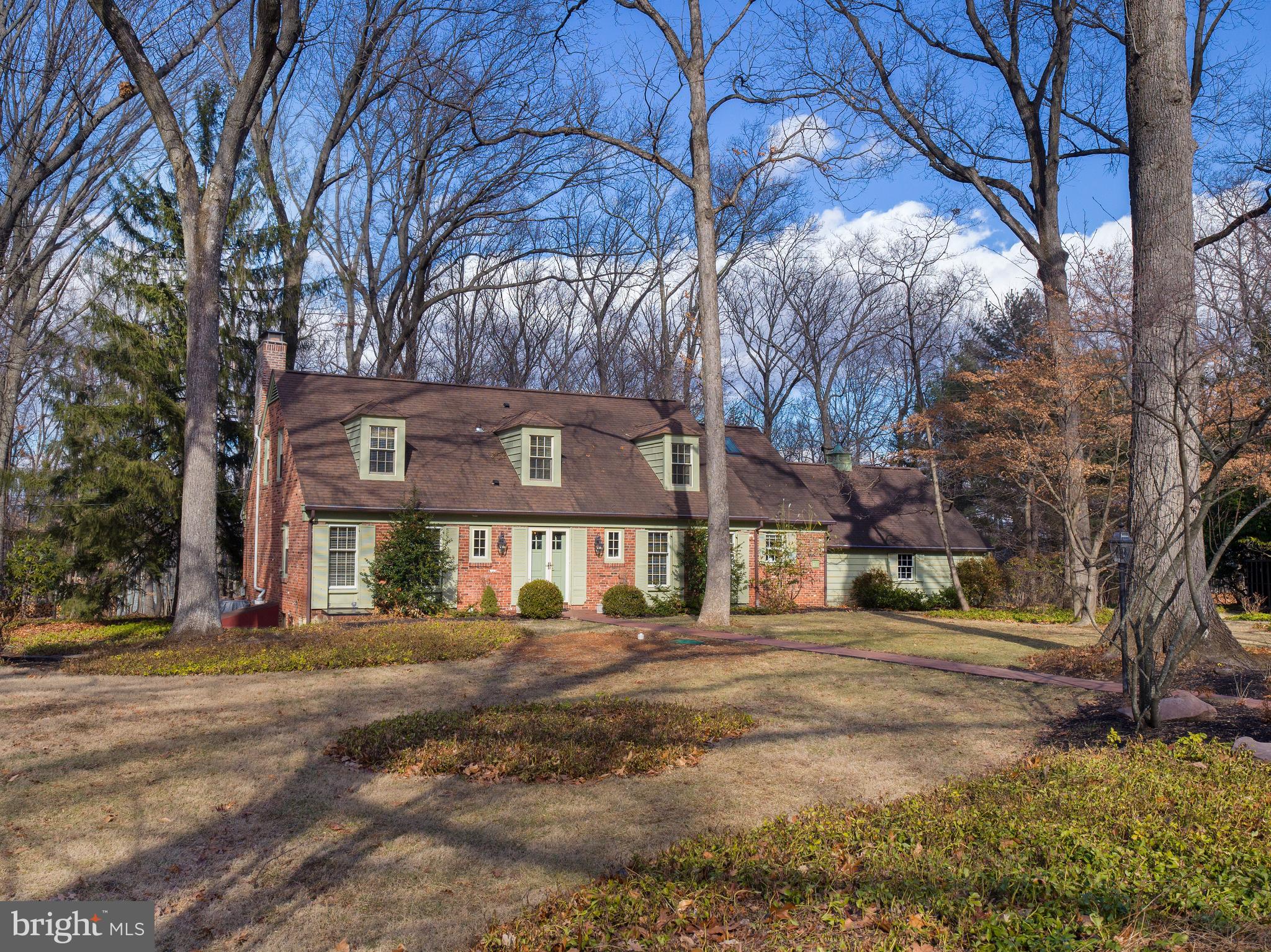 34 Ridgewood Road Wayne, PA 19087 - Photo 1 of 28 a front view of a house with a yard