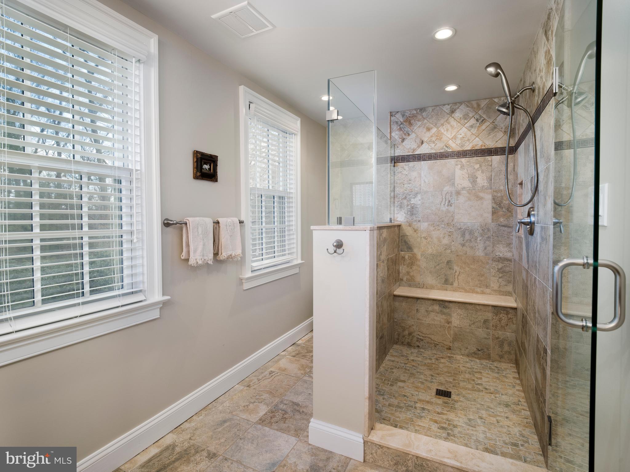 34 Ridgewood Road Wayne, PA 19087 - Photo 20 of 28 a bathroom with a shower and a sink