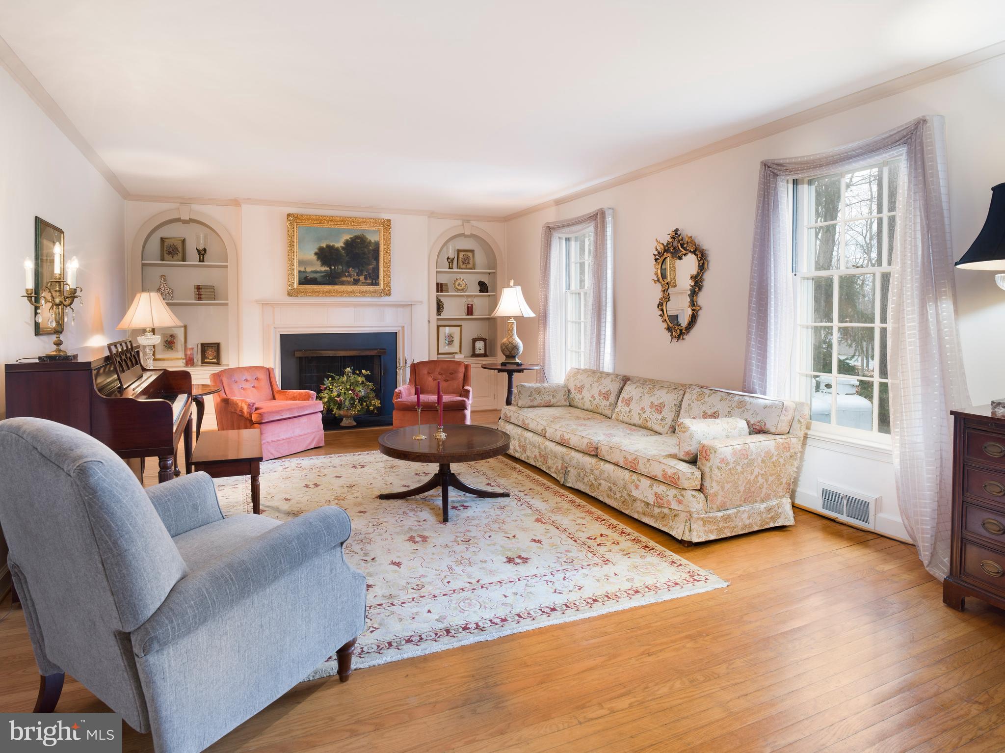 34 Ridgewood Road Wayne, PA 19087 - Photo 4 of 28 a living room with furniture and a fireplace