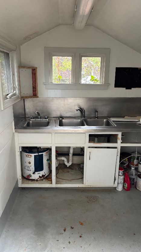 76 Norton Orchard Road Edgartown, MA 02539 - Photo 6 of 7 a kitchen with a stove and a microwave