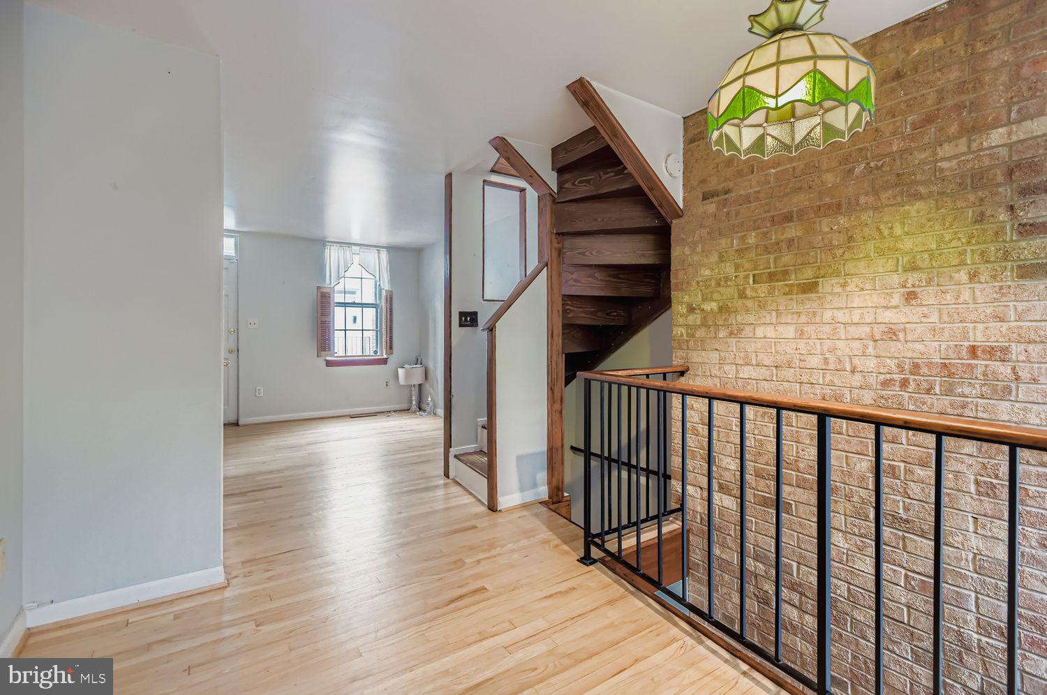 649 Dover Street Baltimore, MD 21230 - Photo 6 of 25 a view of entryway with wooden floor