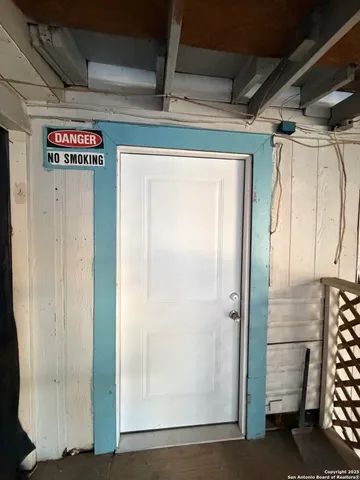 a view of a hallway with elevator