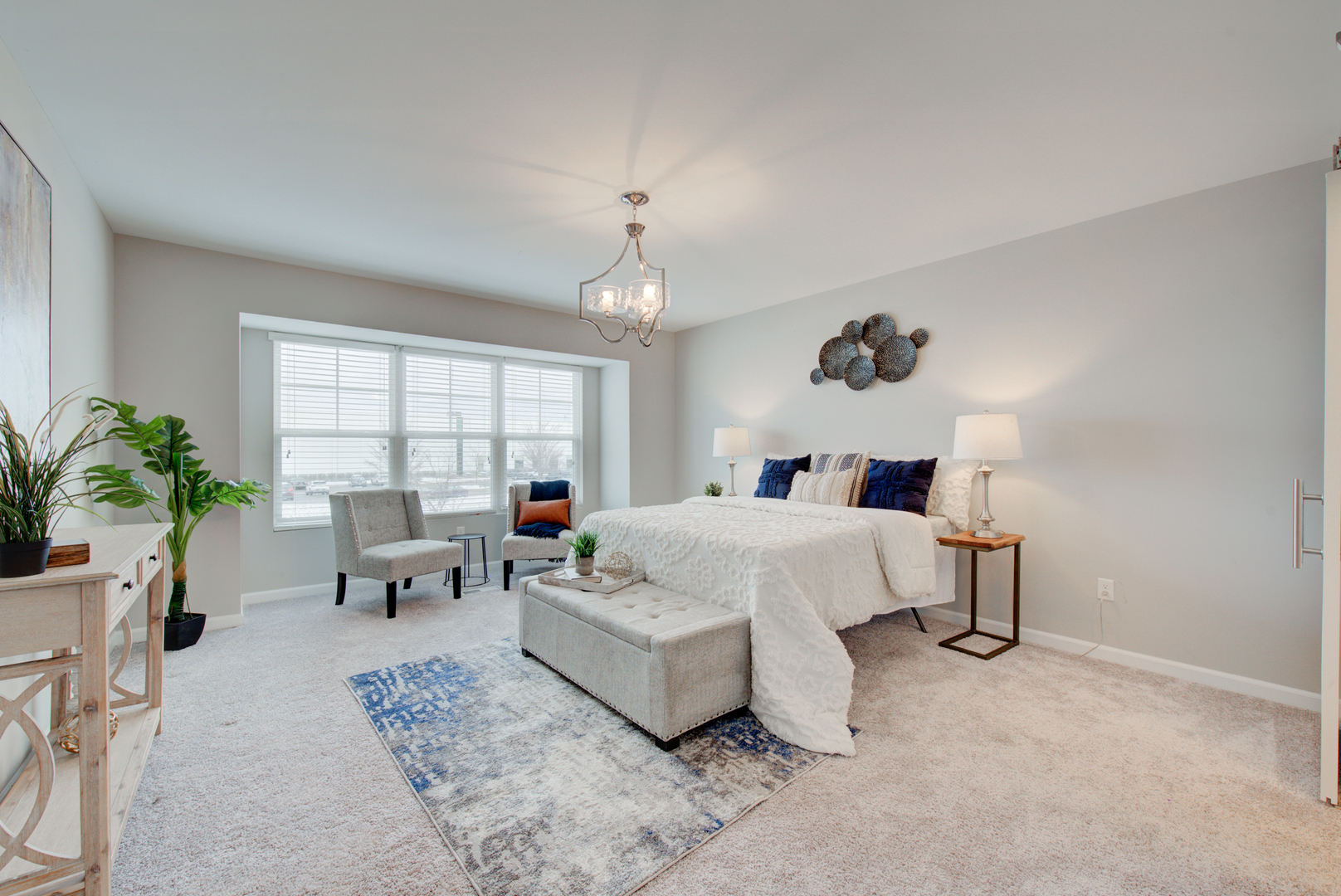 980 Station Boulevard Aurora, IL 60504 - Photo 11 of 27 a bedroom with bed and a large window