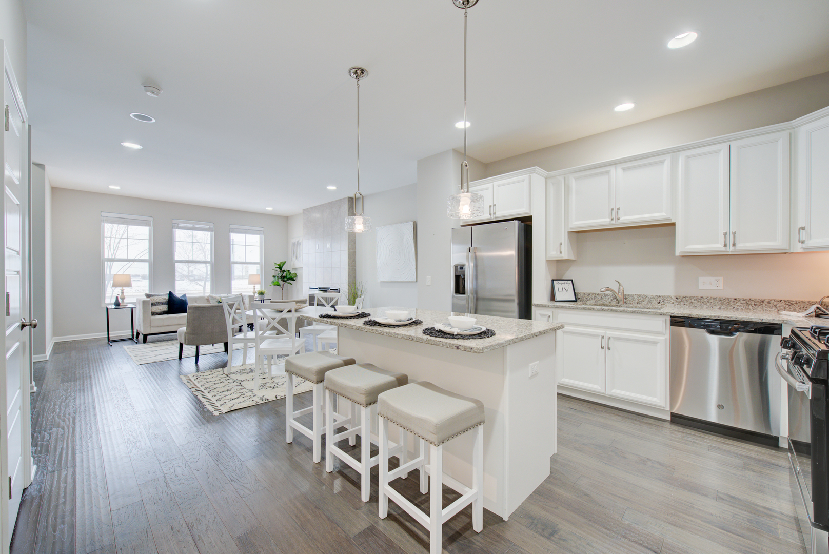 980 Station Boulevard Aurora, IL 60504 - Photo 9 of 27 a large kitchen with a table and chairs