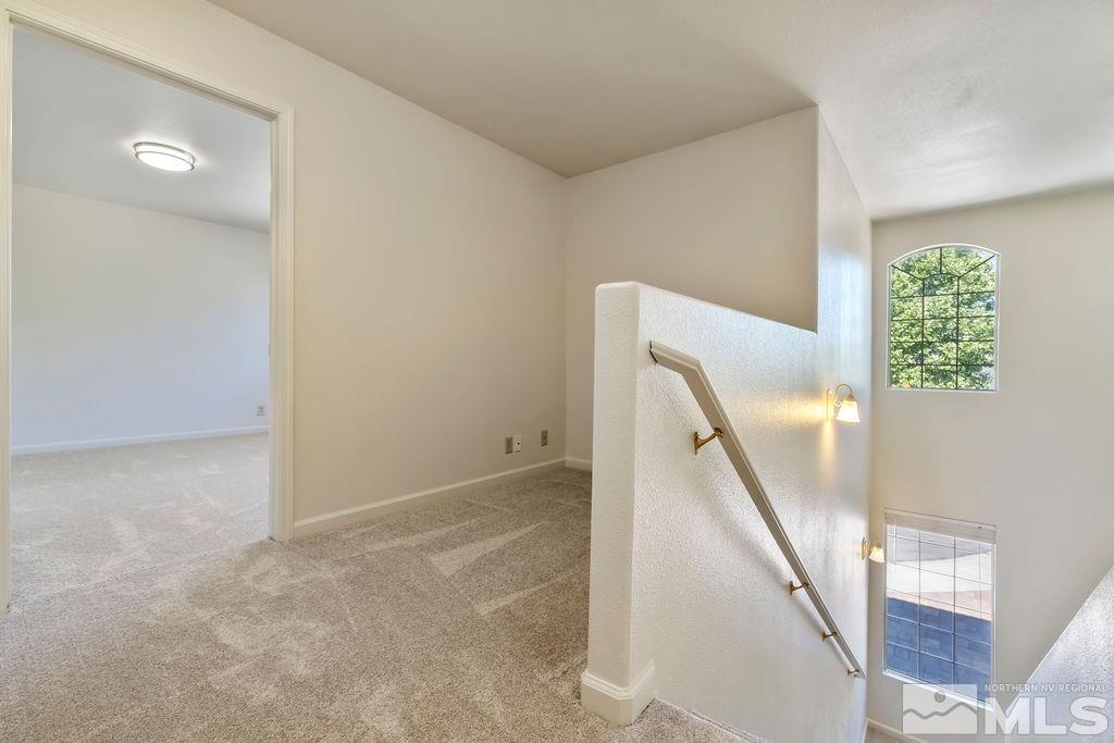 9775 Meadowstar Drive Reno, NV 89506 - Photo 19 of 30 a view of a hallway with staircase