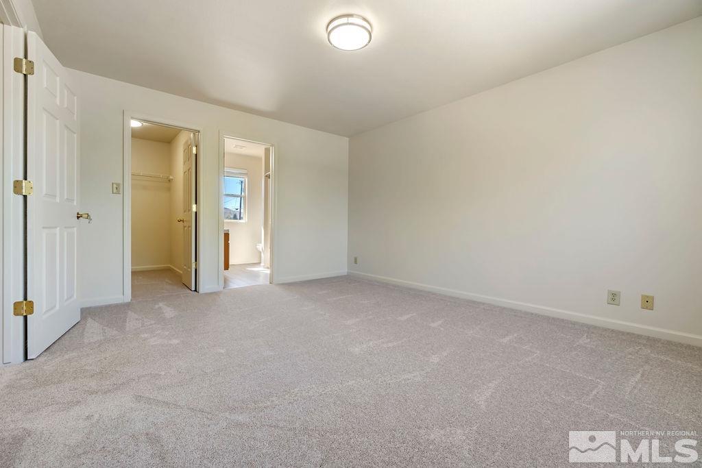 9775 Meadowstar Drive Reno, NV 89506 - Photo 20 of 30 an empty room with closet area