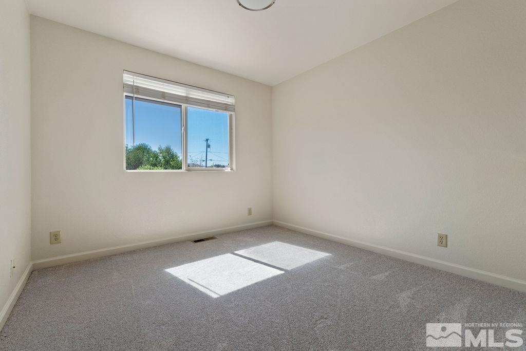 9775 Meadowstar Drive Reno, NV 89506 - Photo 25 of 30 an empty room with a window