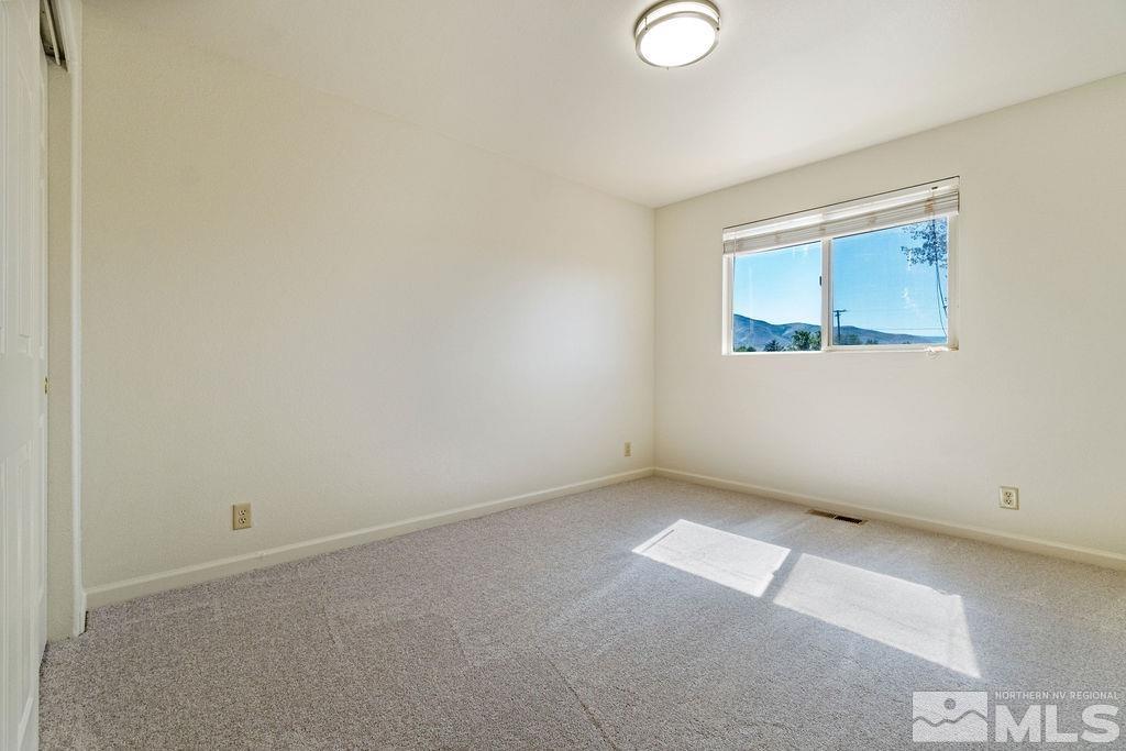 9775 Meadowstar Drive Reno, NV 89506 - Photo 28 of 30 an empty room with a window