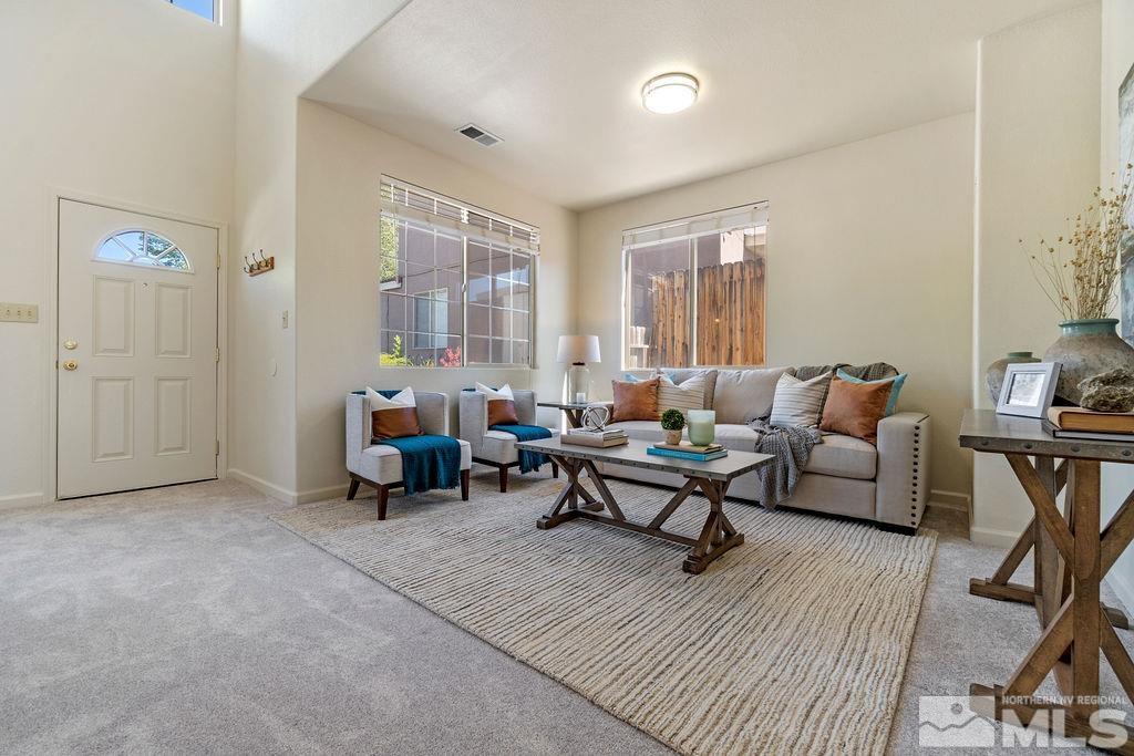 9775 Meadowstar Drive Reno, NV 89506 - Photo 6 of 30 a living room with furniture and a wooden floor