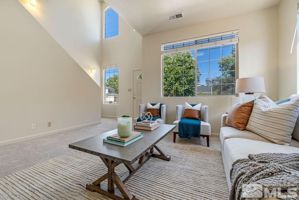 9775 Meadowstar Drive Reno, NV 89506 - Photo 7 of 30 a living room with furniture and a window