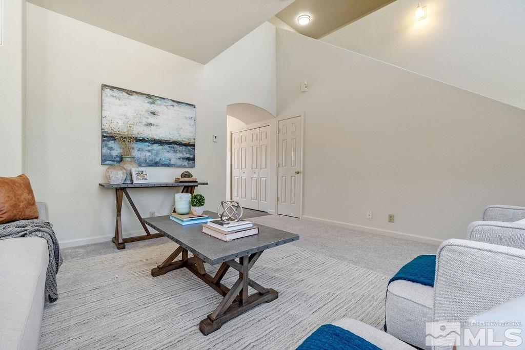 9775 Meadowstar Drive Reno, NV 89506 - Photo 8 of 30 a living room with furniture and a wooden floor
