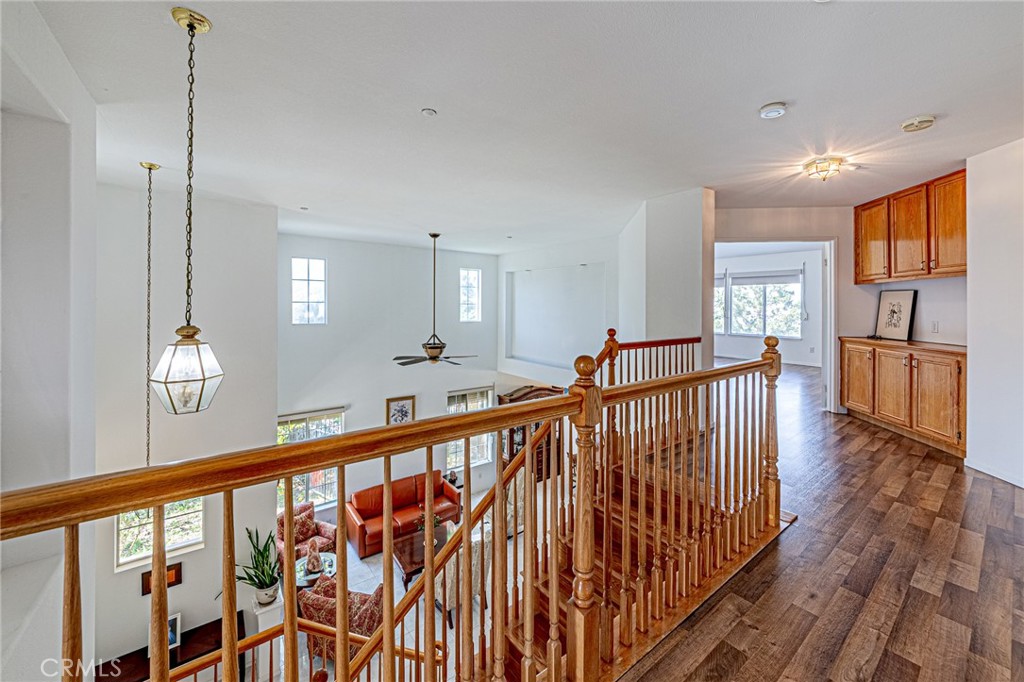 5423 Canmore Court Riverside, CA 92507 - Photo 18 of 58 a view of a hallway with wooden floor windows and stairs