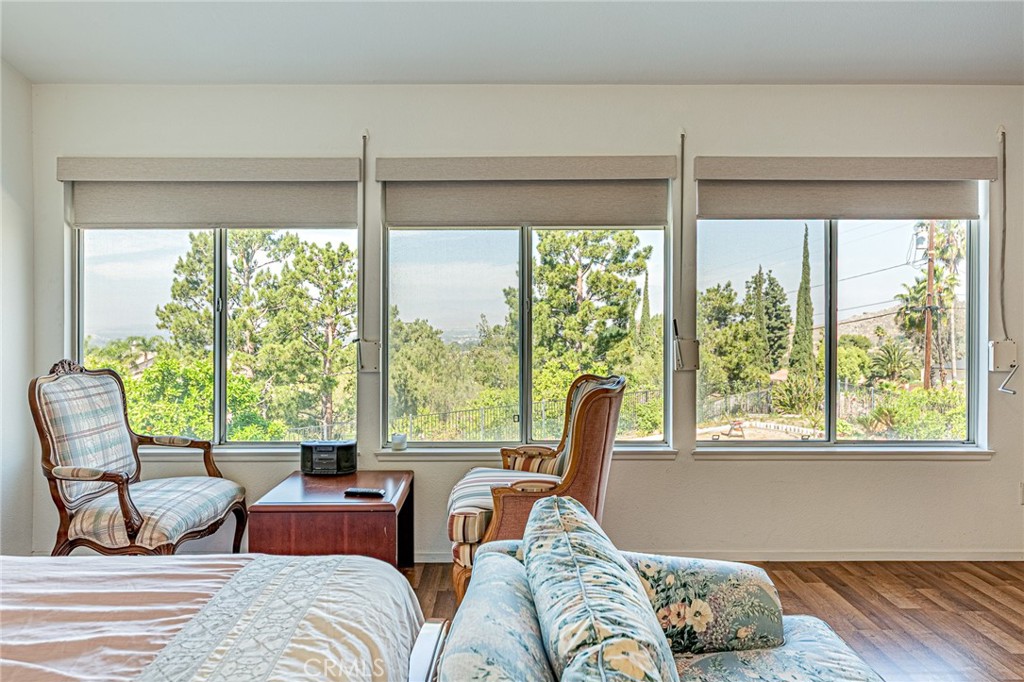 5423 Canmore Court Riverside, CA 92507 - Photo 22 of 58 a living room with furniture and a large window