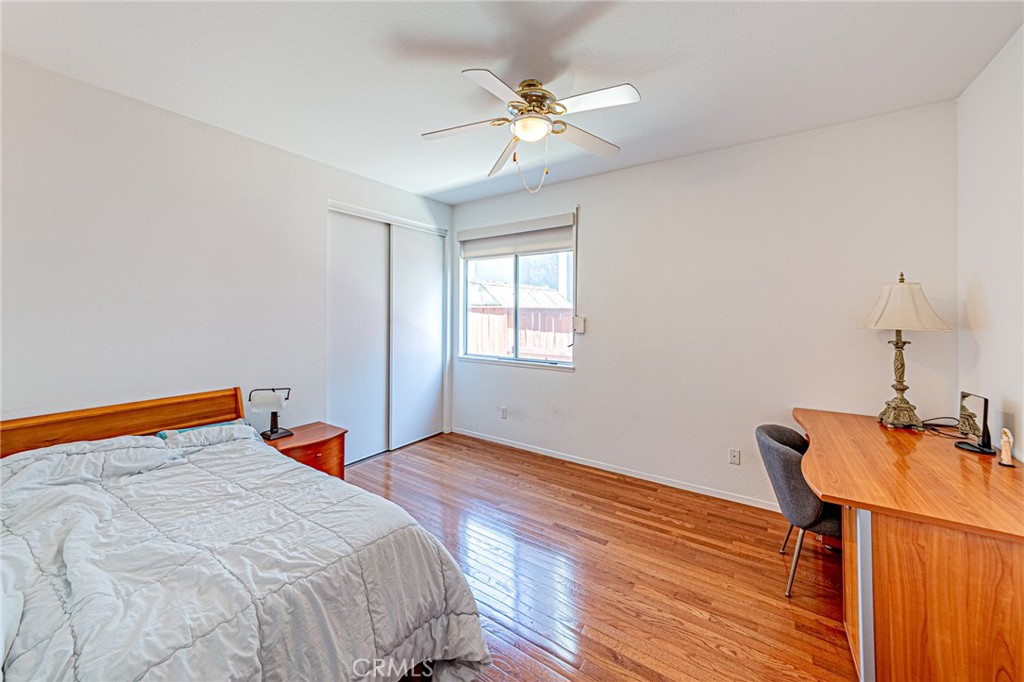5423 Canmore Court Riverside, CA 92507 - Photo 26 of 58 a bedroom with a bed and a window