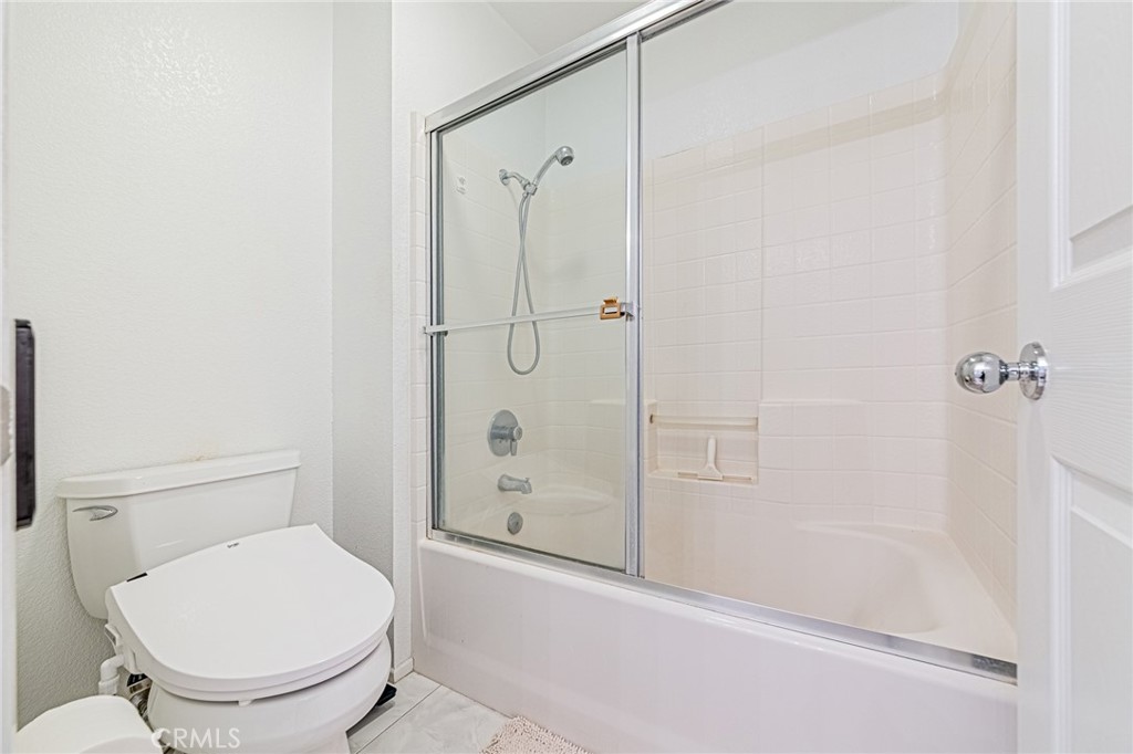 5423 Canmore Court Riverside, CA 92507 - Photo 35 of 58 a bathroom with a toilet and a shower