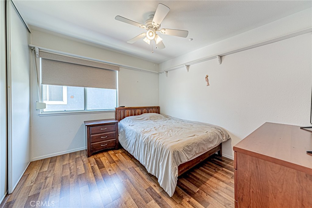 5423 Canmore Court Riverside, CA 92507 - Photo 36 of 58 a bedroom with a bed and a window