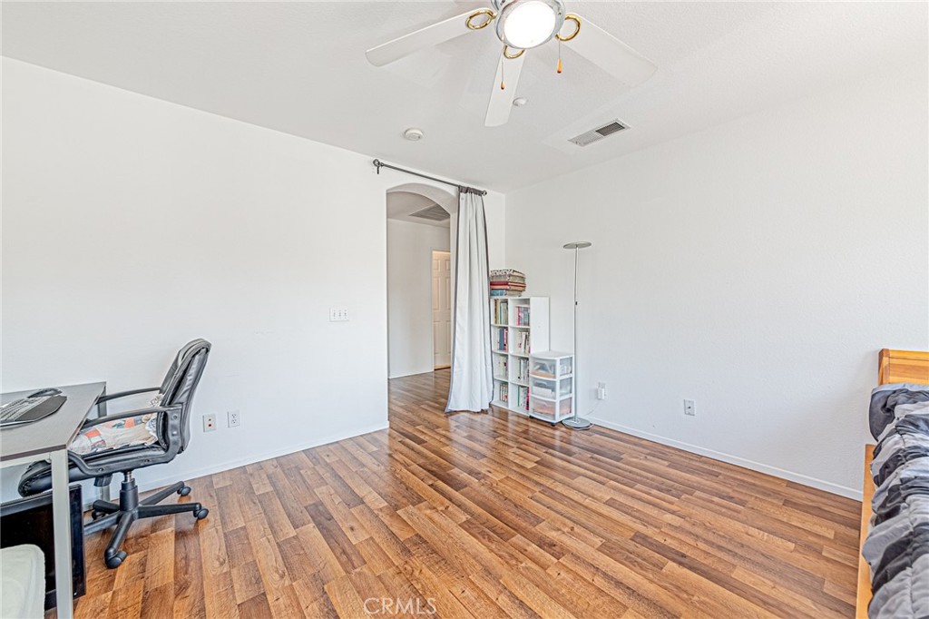 5423 Canmore Court Riverside, CA 92507 - Photo 41 of 58 a view of a bedroom with wooden floor and bedroom