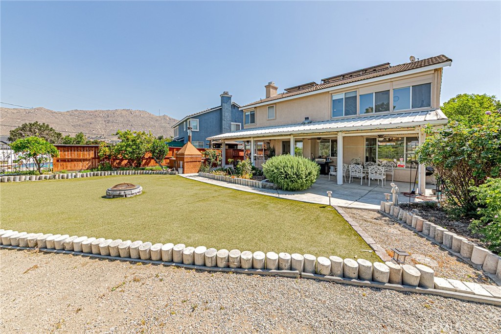 5423 Canmore Court Riverside, CA 92507 - Photo 52 of 58 a view of a house with a yard and sitting area